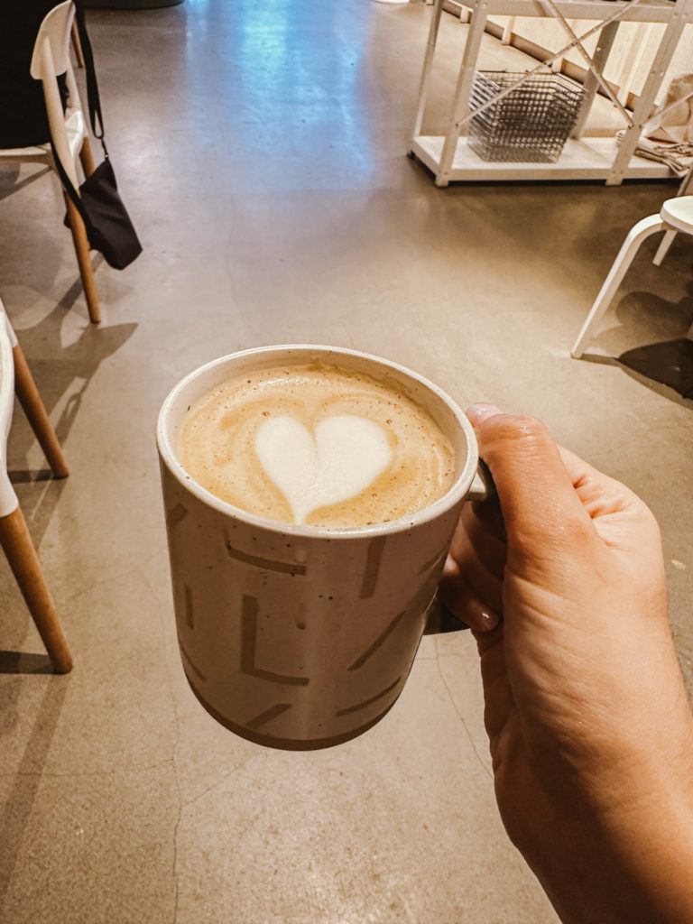 Photo of latte with a heart latte art from blog post on the best vegetarian friendly restaurants portland maine