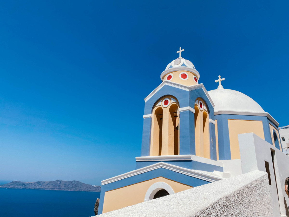 Avoid the Crowds: The Ultimate Santorini Travel Tips - Champagne Flight